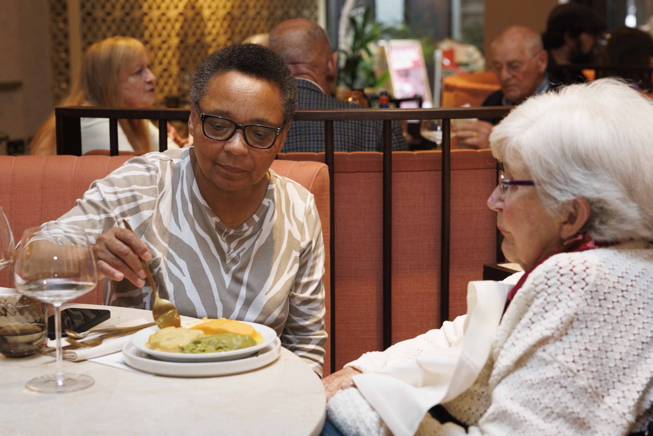 Mary Hollington and Sarah Briscoe enjoy a modified meal