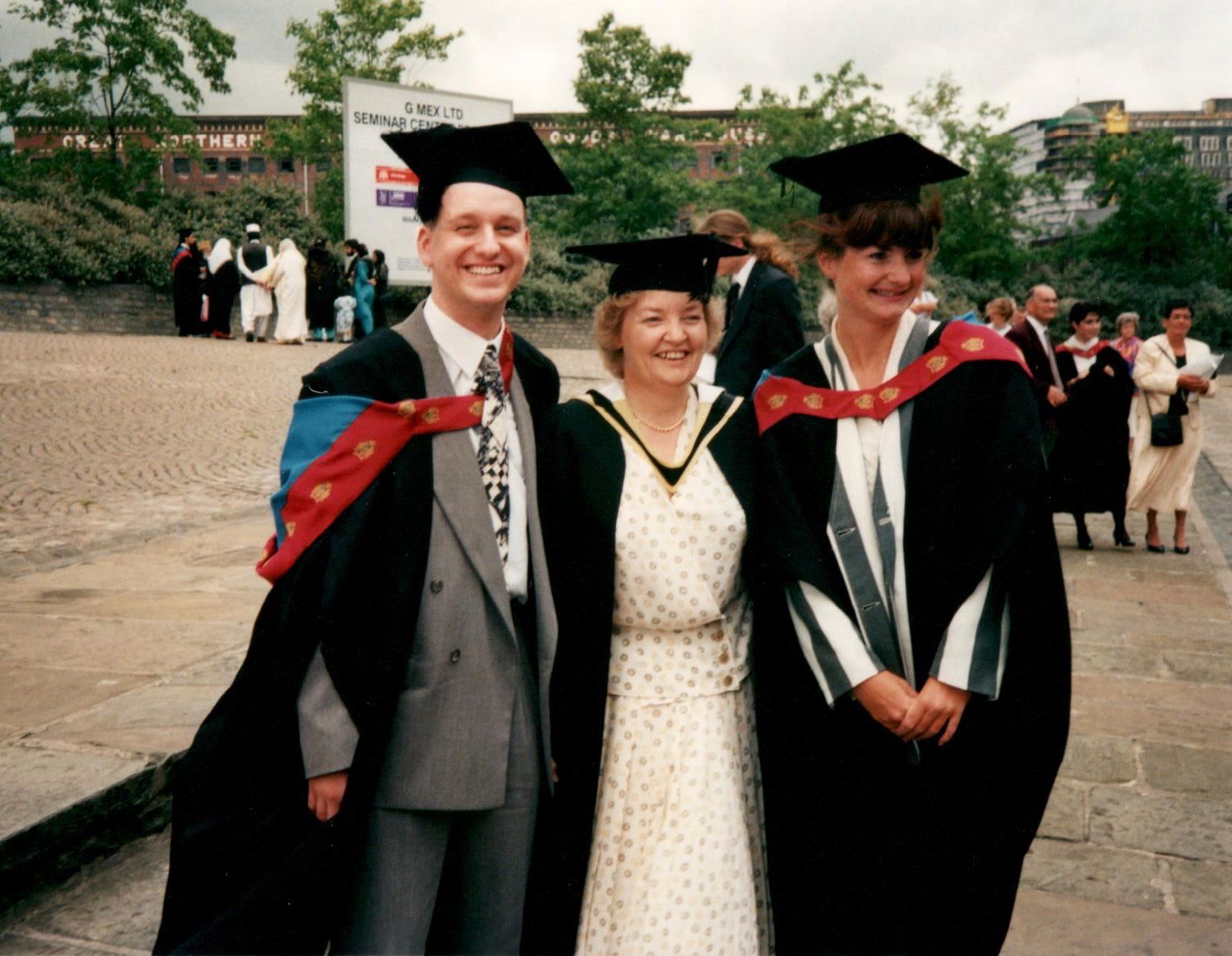 Former chair Sandra Robertson with Dr Sean Pert and friend during their graduation